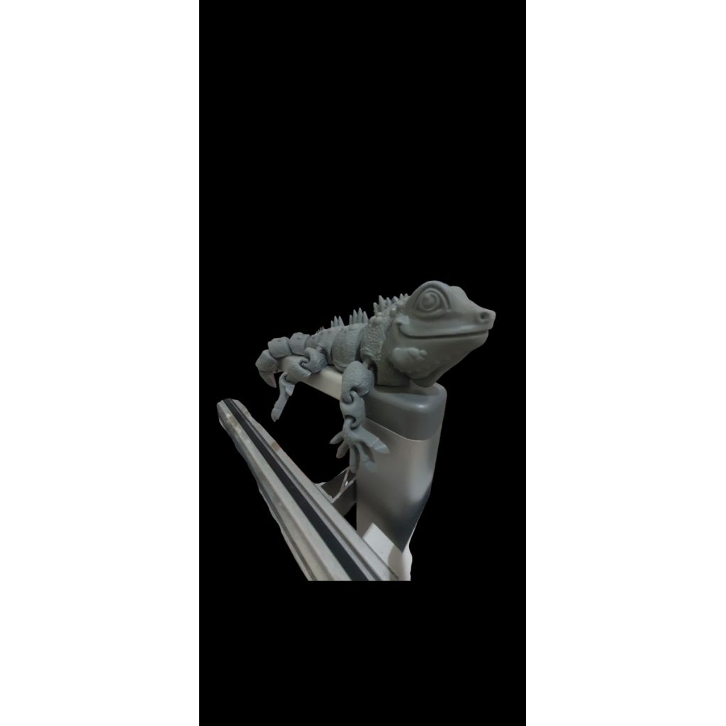 Mainan iguana flexi