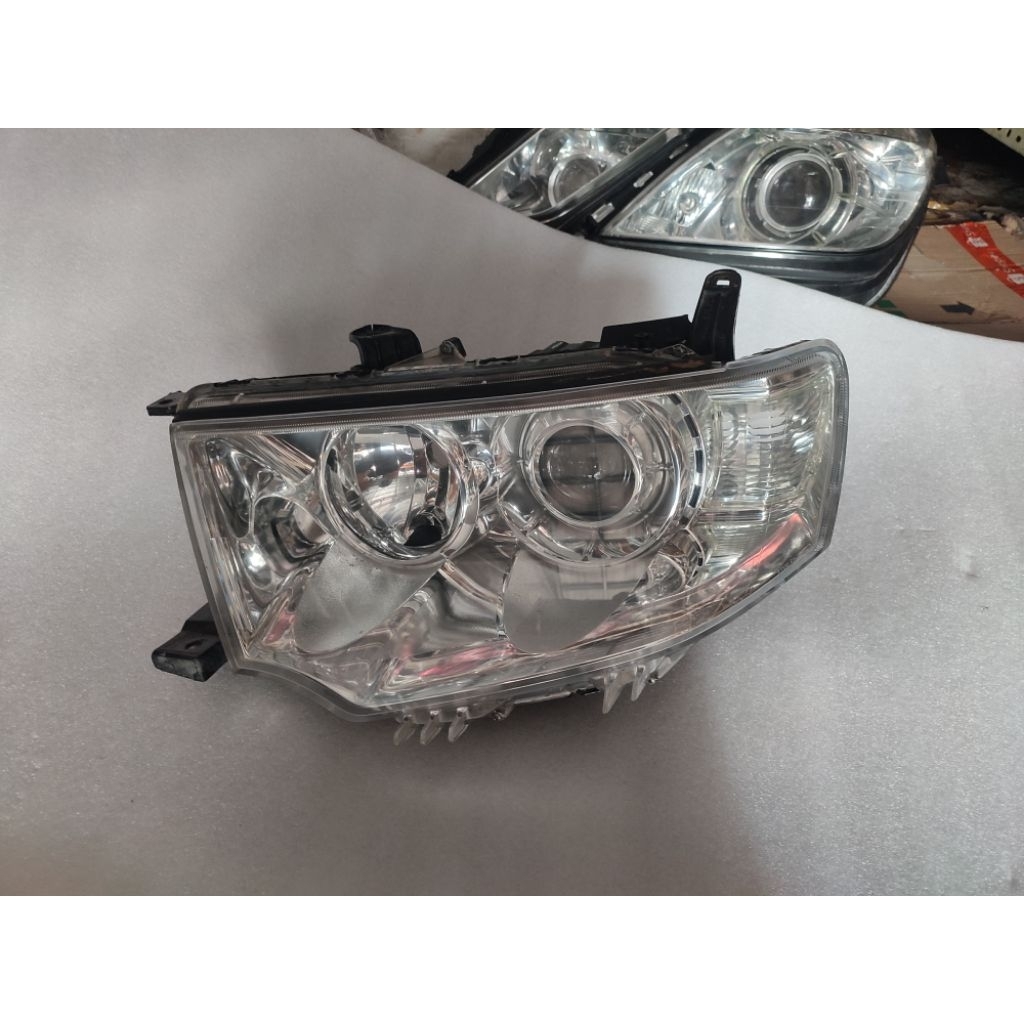 headlamp lampu depan Mitsubishi Pajero Dakar 2012 2013 2014 original