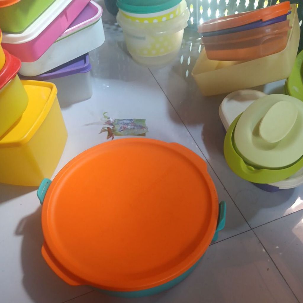 click to go round tupperware