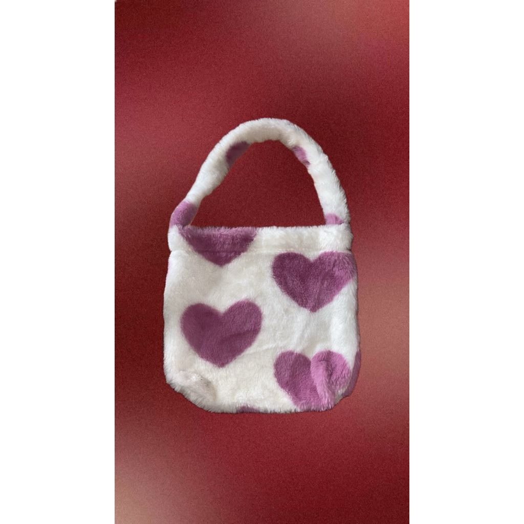 Preloved, tas bulu lembut