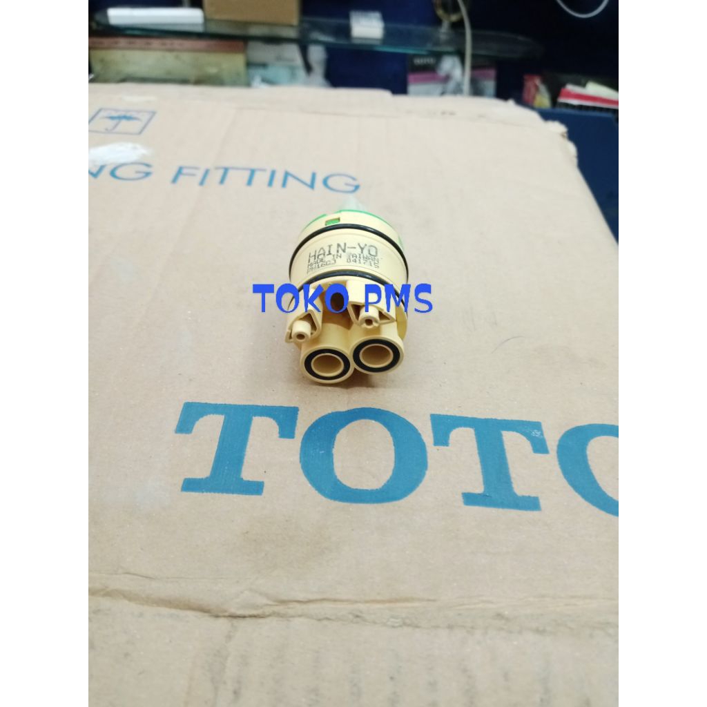 spindel kran panas dingin merk toto /jantung kran toto mixer