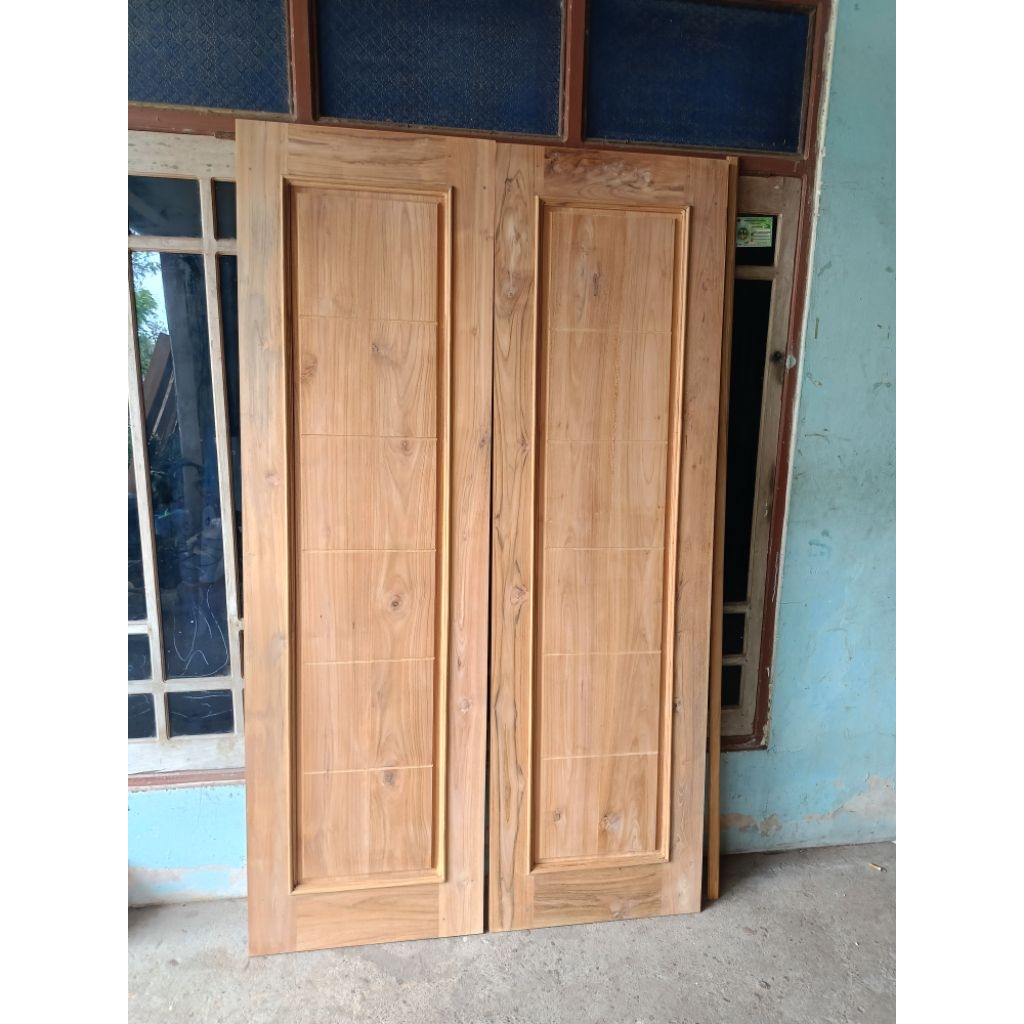 pintu kupu-kupu bahan kayu jati