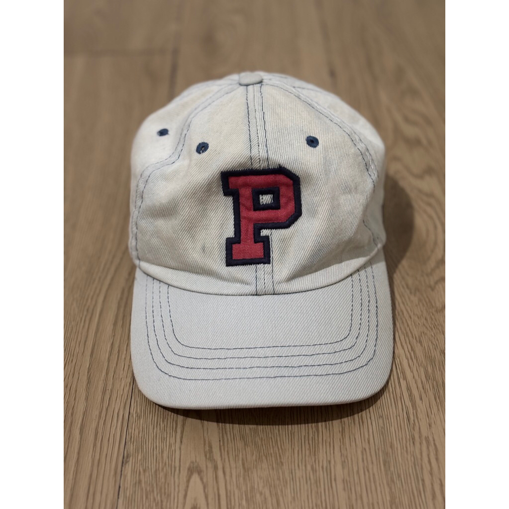 Topi polo logo P