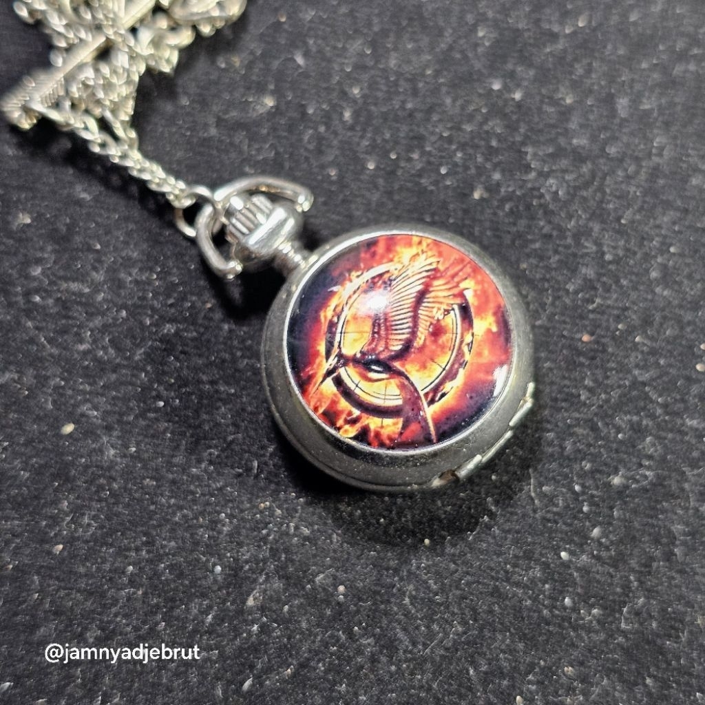 Jam Pocket Hunger Games Mockingjay Black Red Bekas