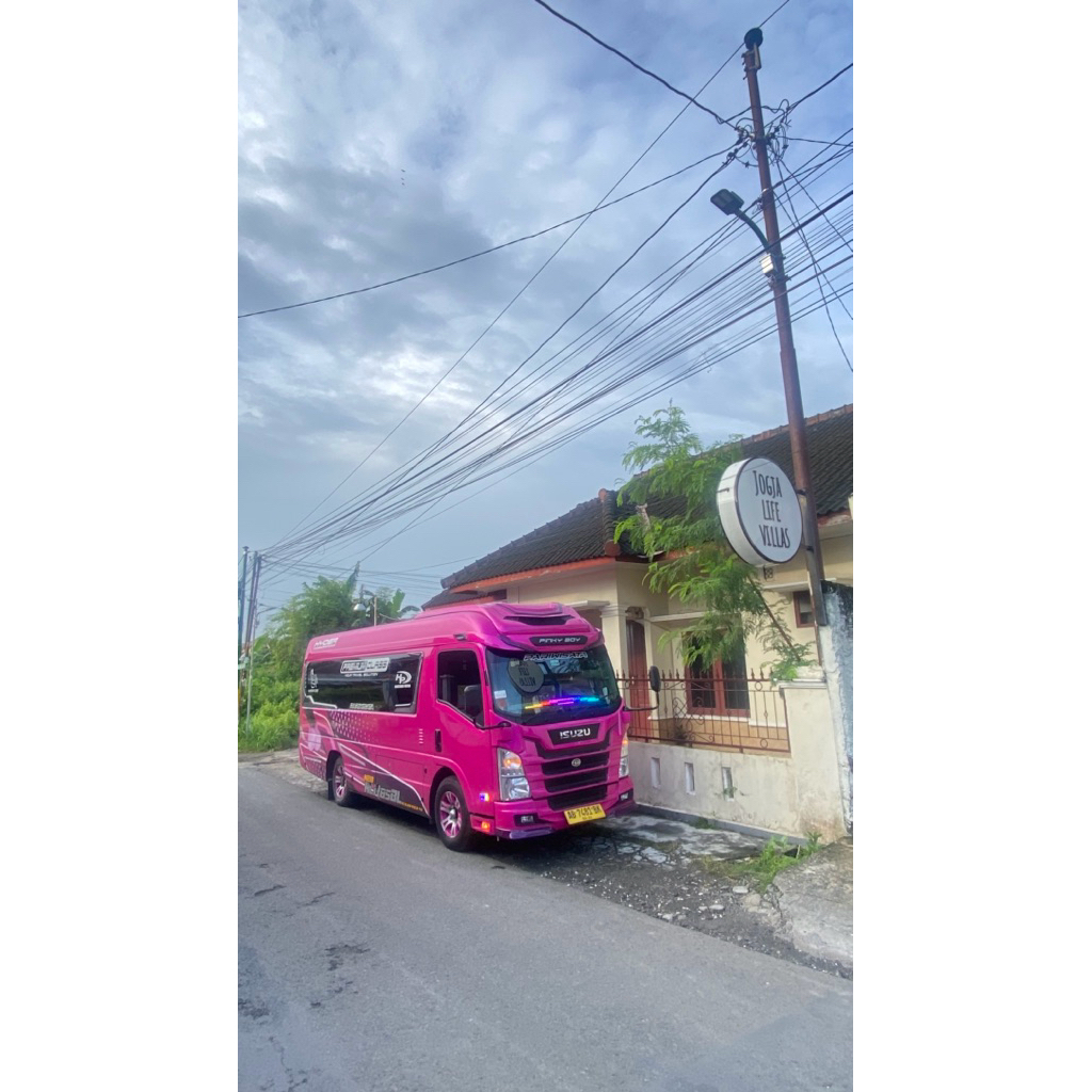 sewa ELF NLR Premium Euro4 19 Seat Penumpang di jogja
