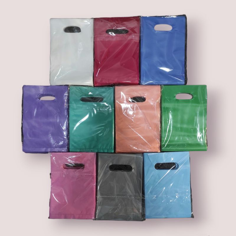 Plastik Plong HD Polos Oval Party Tebal Isi 100