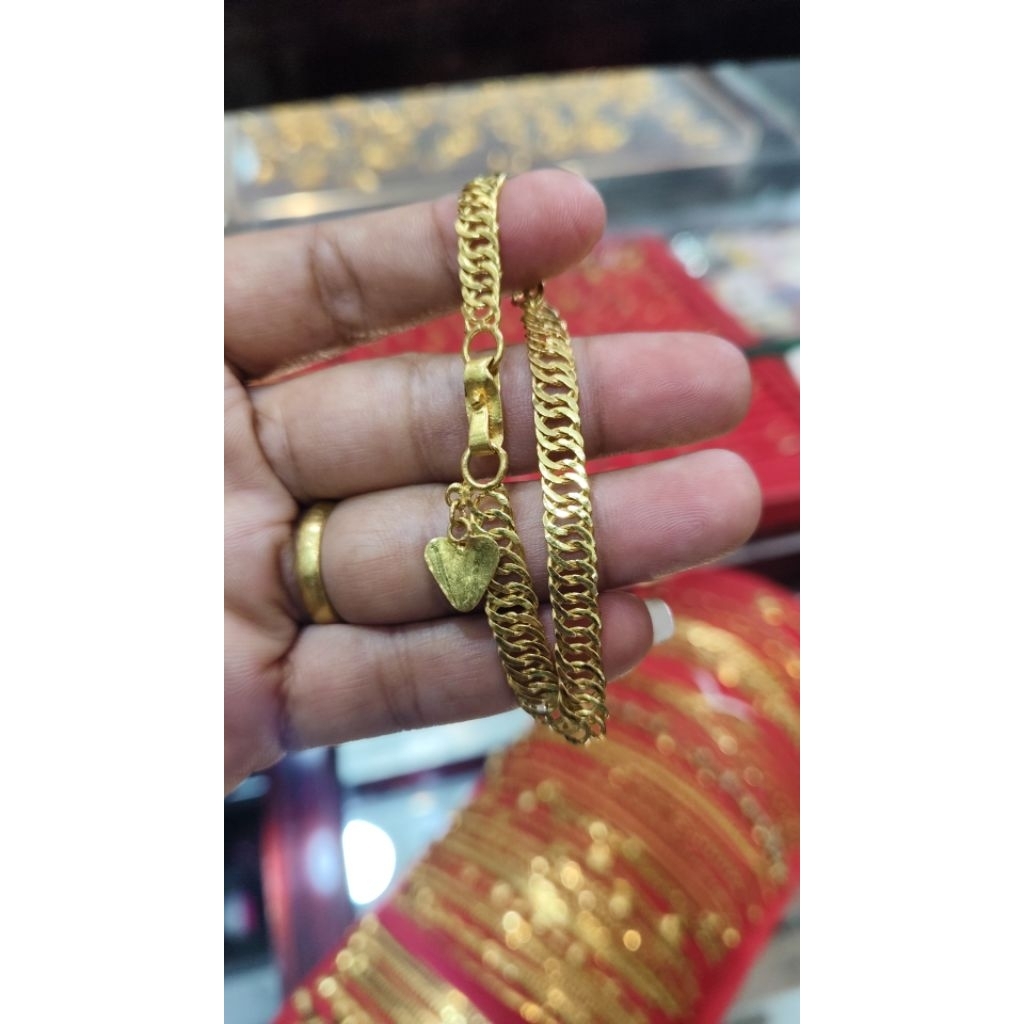 gelang gosok emas london