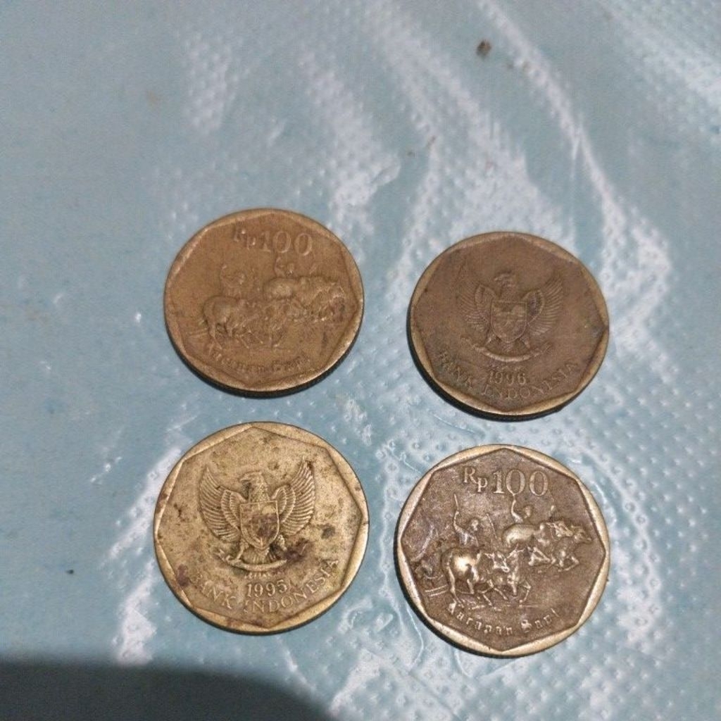 uang logam 100 karapan sapi