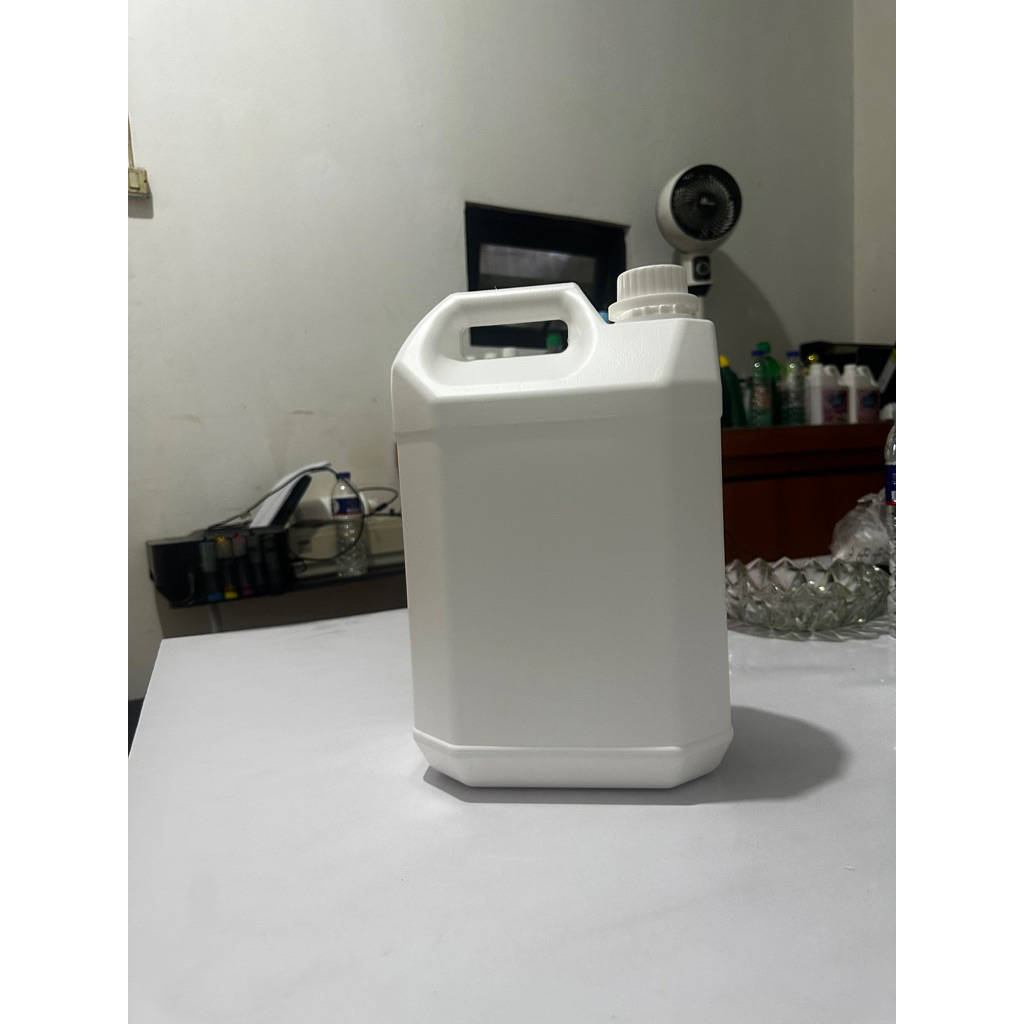 jerigen 5 liter vs permium warna putih