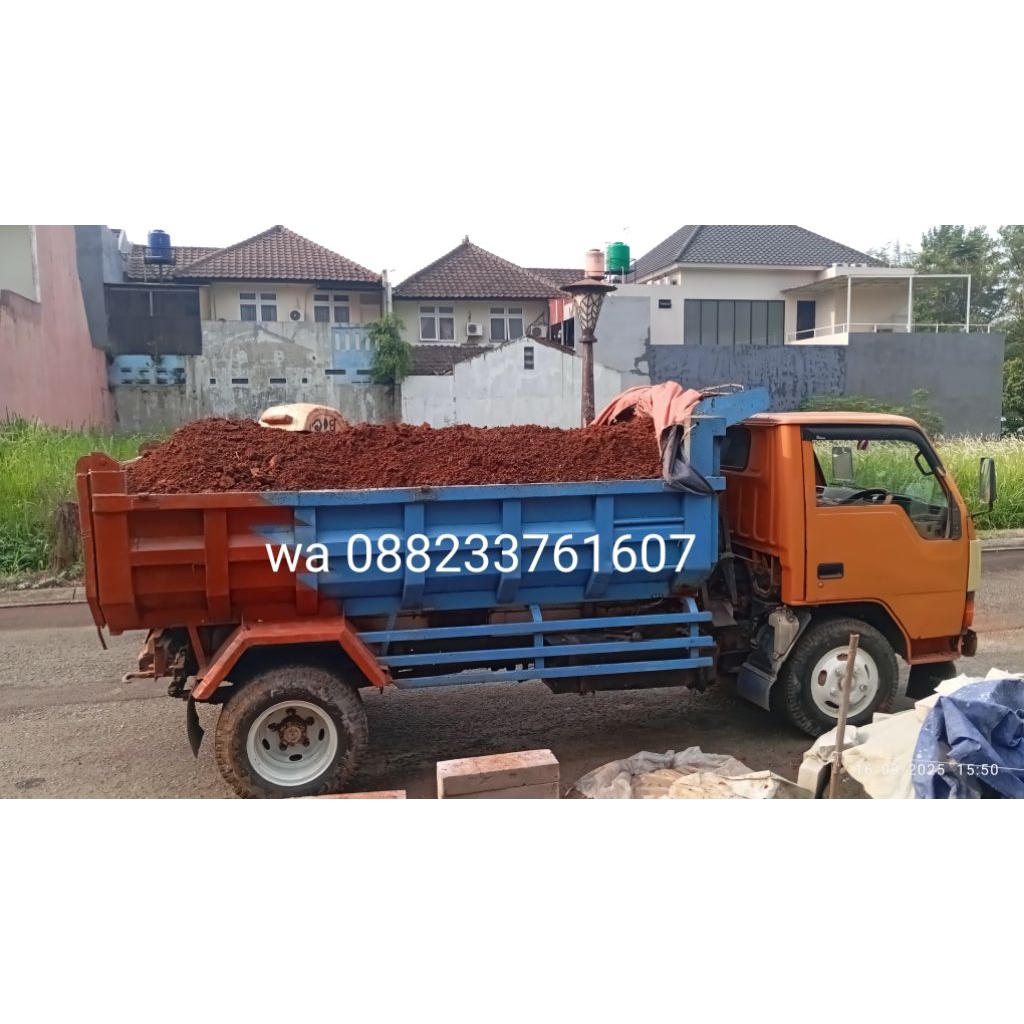 pengurugan tanah merah