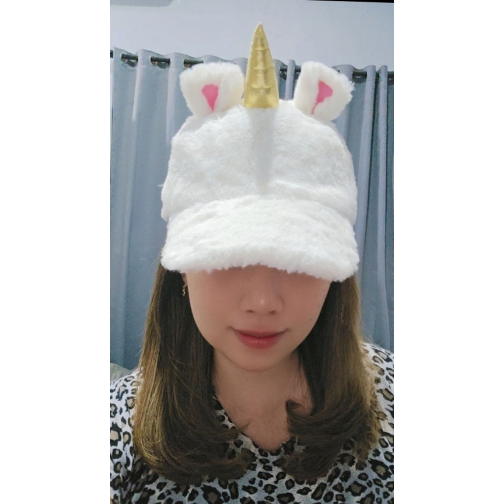 Topi fluffy unicorn minion USJ