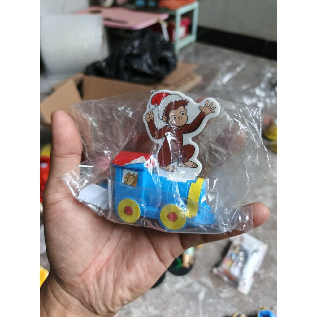 figure curious george e