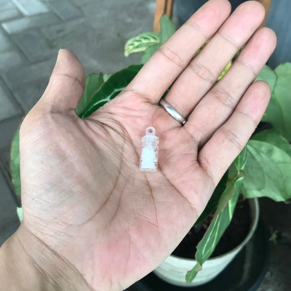 LIONTIN BOTOL KACA ISI GARAM RUWATAN