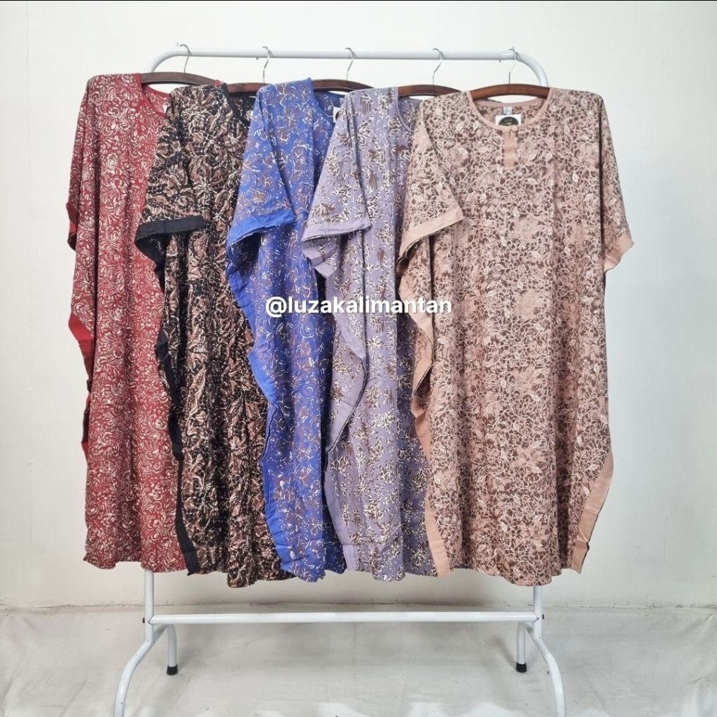 daster lowo sherina luza