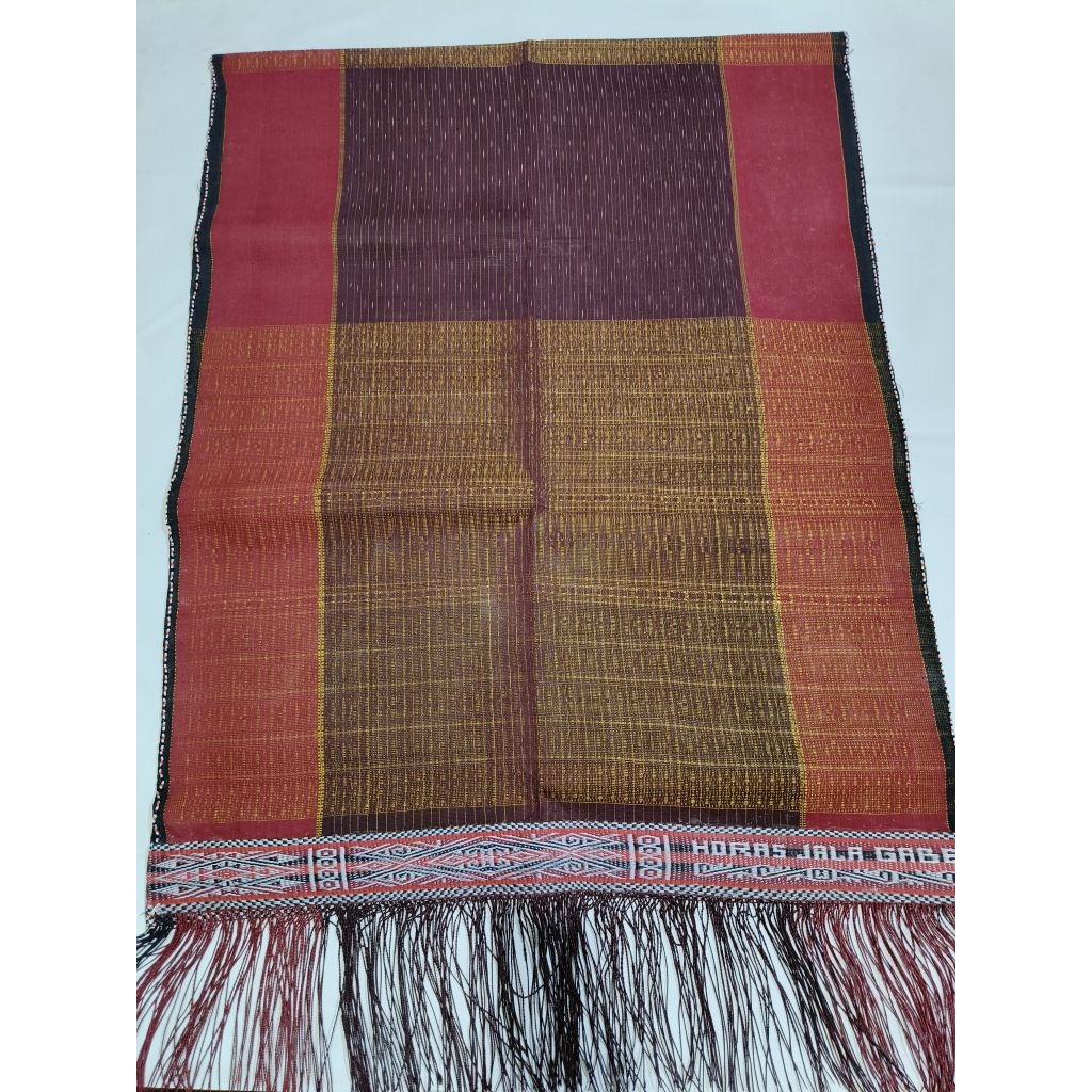 Ulos ragi hotang tenun tangan pakaian adat pria Batak toba