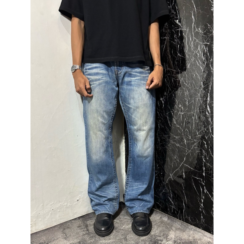 Bootcut Fadeing Blue Jeans Washed by ANDREW MACKENZIE