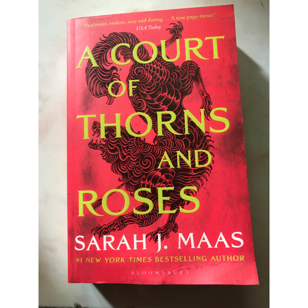A Court Of Thorns And Roses • Sarah J. Maas
