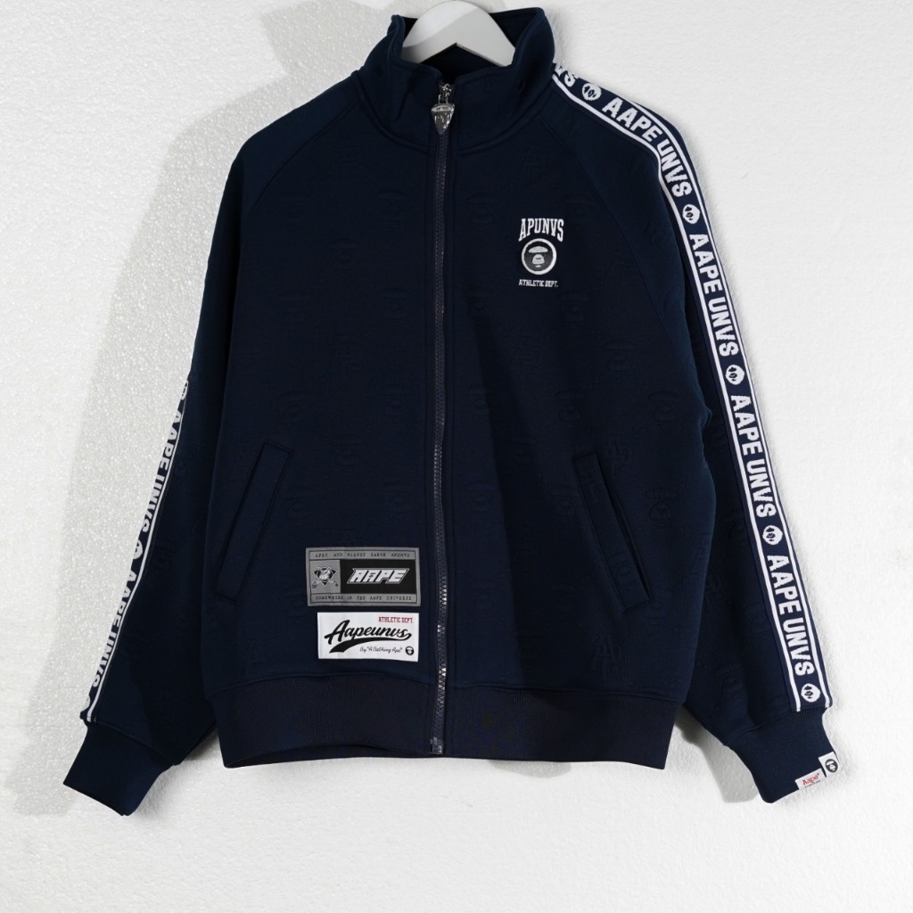 Jaket AAPE UNVS BAND TAPE SHOULDER WHITE ALL OVER LOGO NAVY ZIP TRACK JACKET 100% ORIGINAL