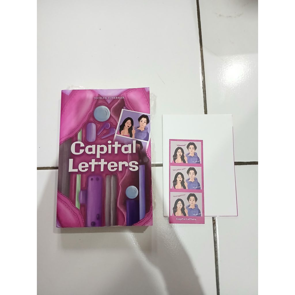 Preloved novel Capital letters