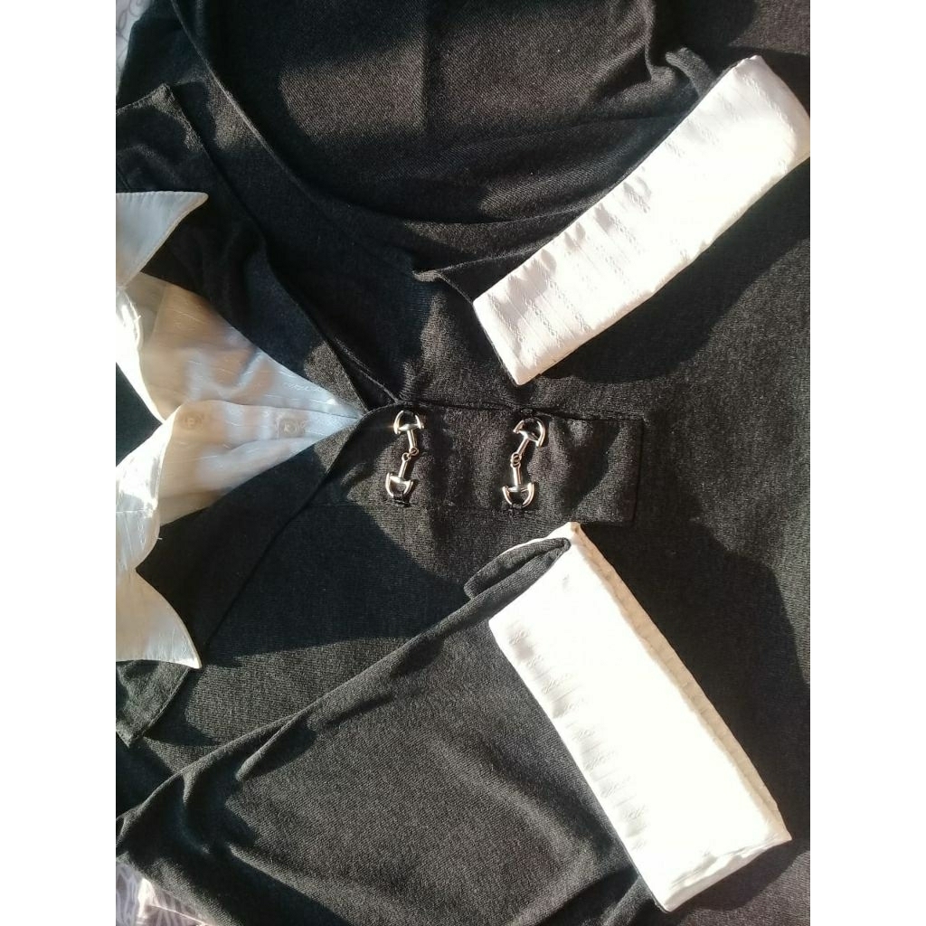 kaos kerah merk THEORIA