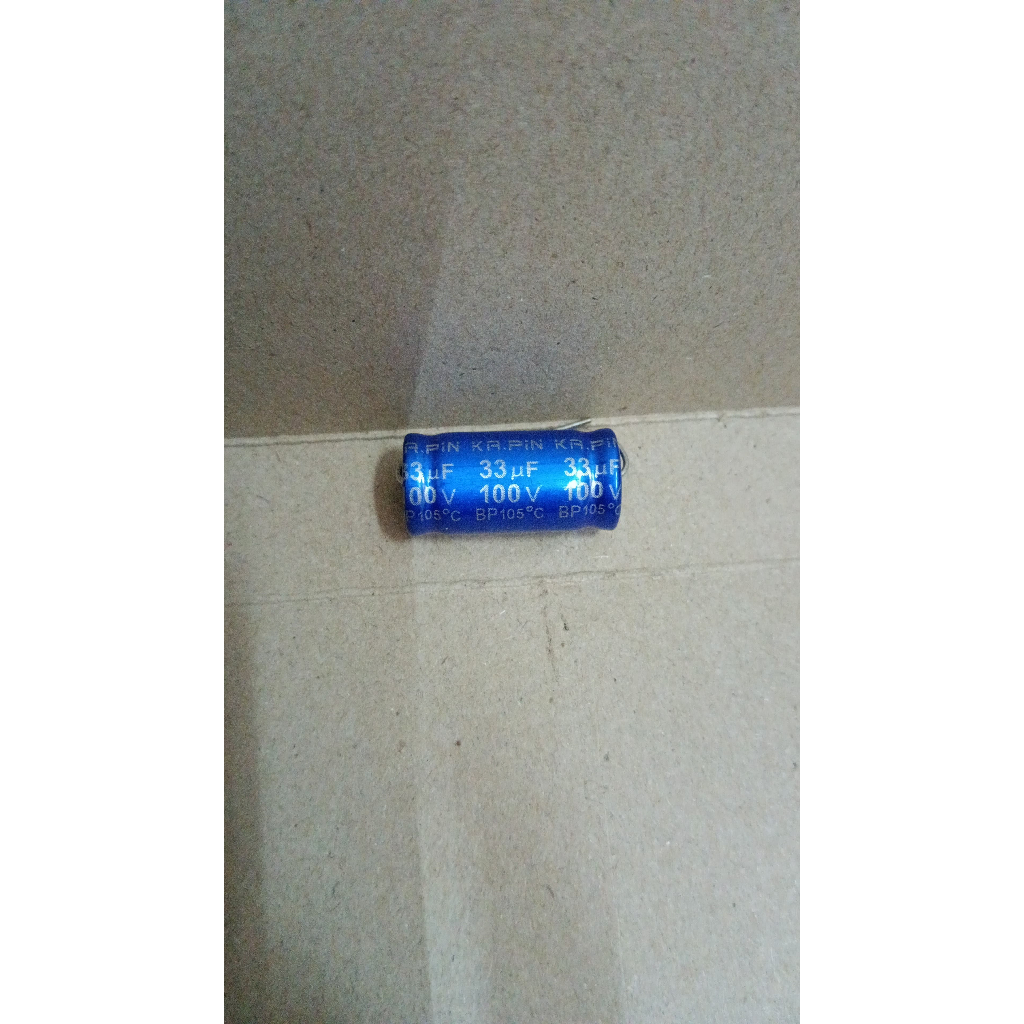 6607 kapasitor elco nonpolar np non polar 33uf 33 uf 100v ka.pin ka-pin ka pin