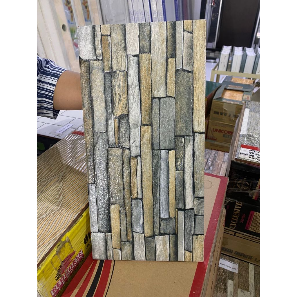 MUSTIKA KRISOLIT MEDIUM GRISS BROWN/ KERAMIK 20X40 /KERAMIK DINDING TERAS, PAGAR, TIANG /MUSTIKA KRI