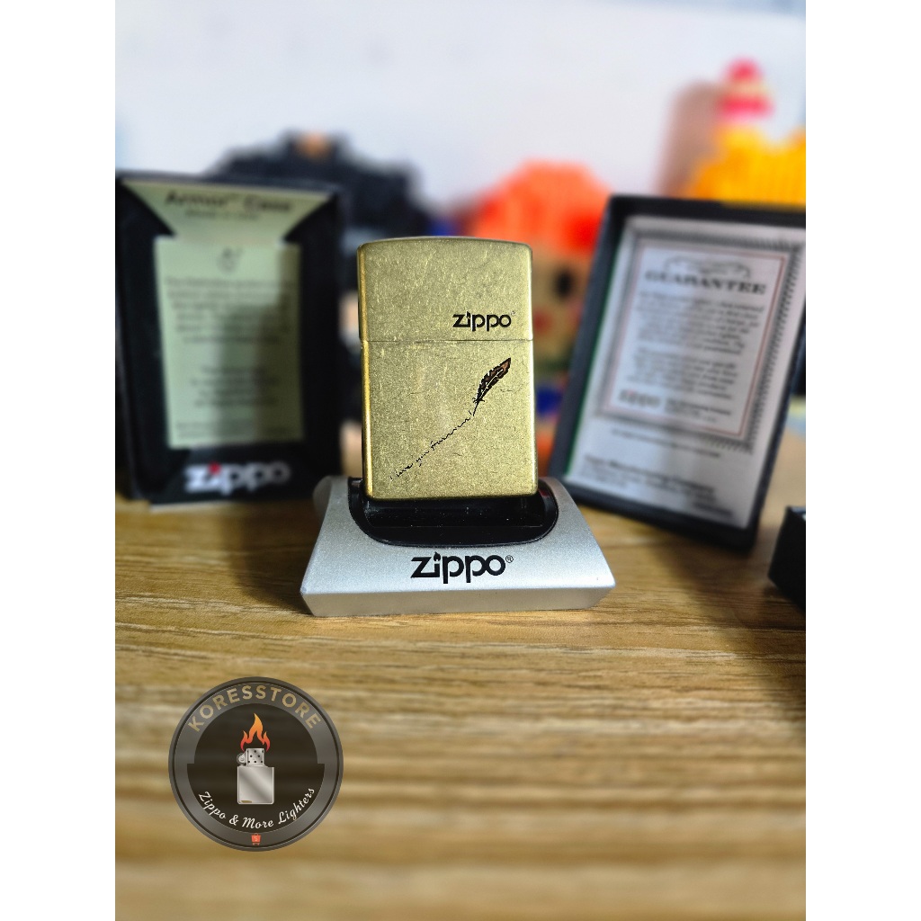ZIPPO FEATHER SIGN GOLD BRASS LIMITED EDITION MADE IN USA