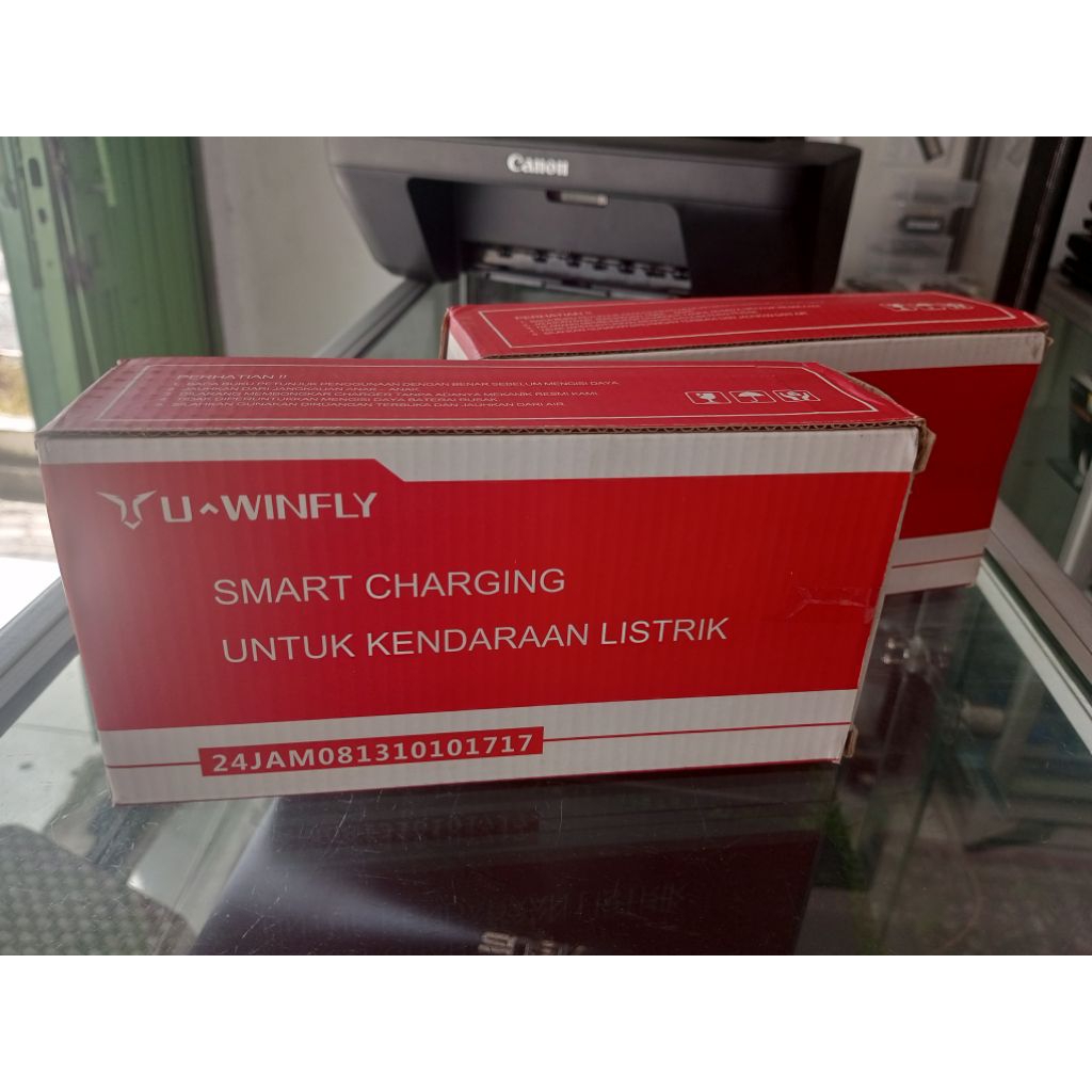 adaptor cas sepeda listrik original merk uwinfly