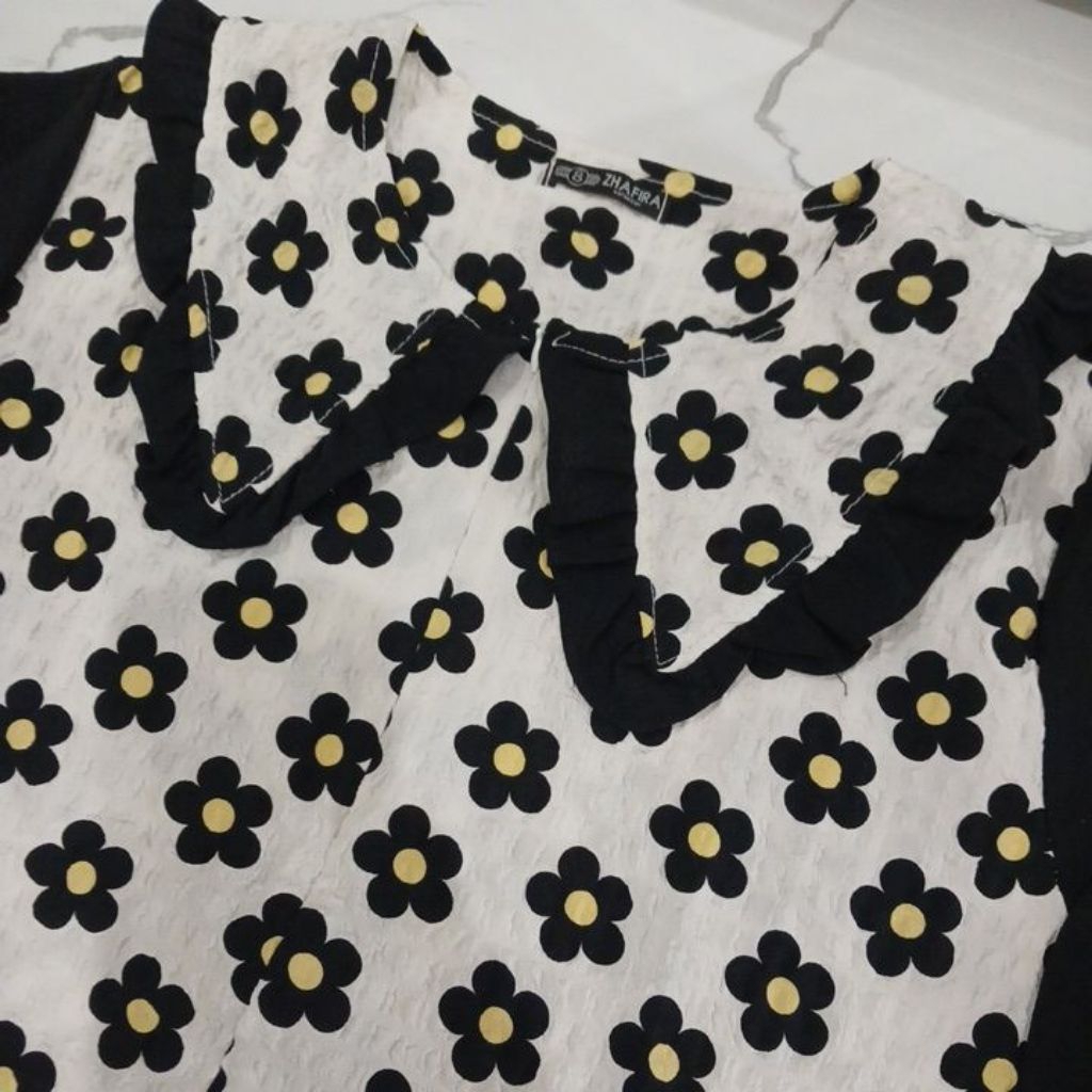 Gamis atau baju pantai