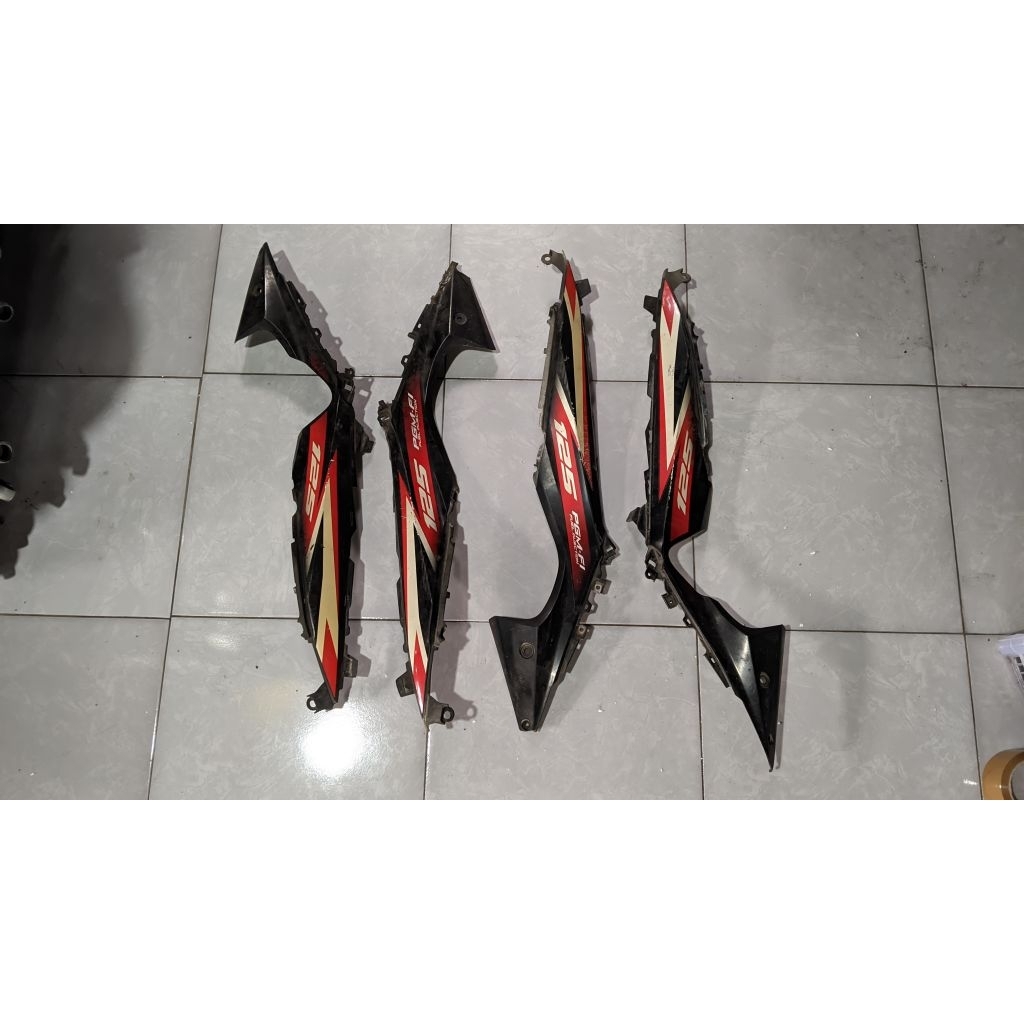 cover sambungan body tengah supra 125 fi