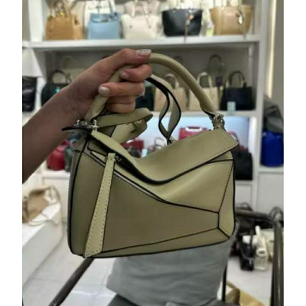 Puzzle bag by madelyn bags