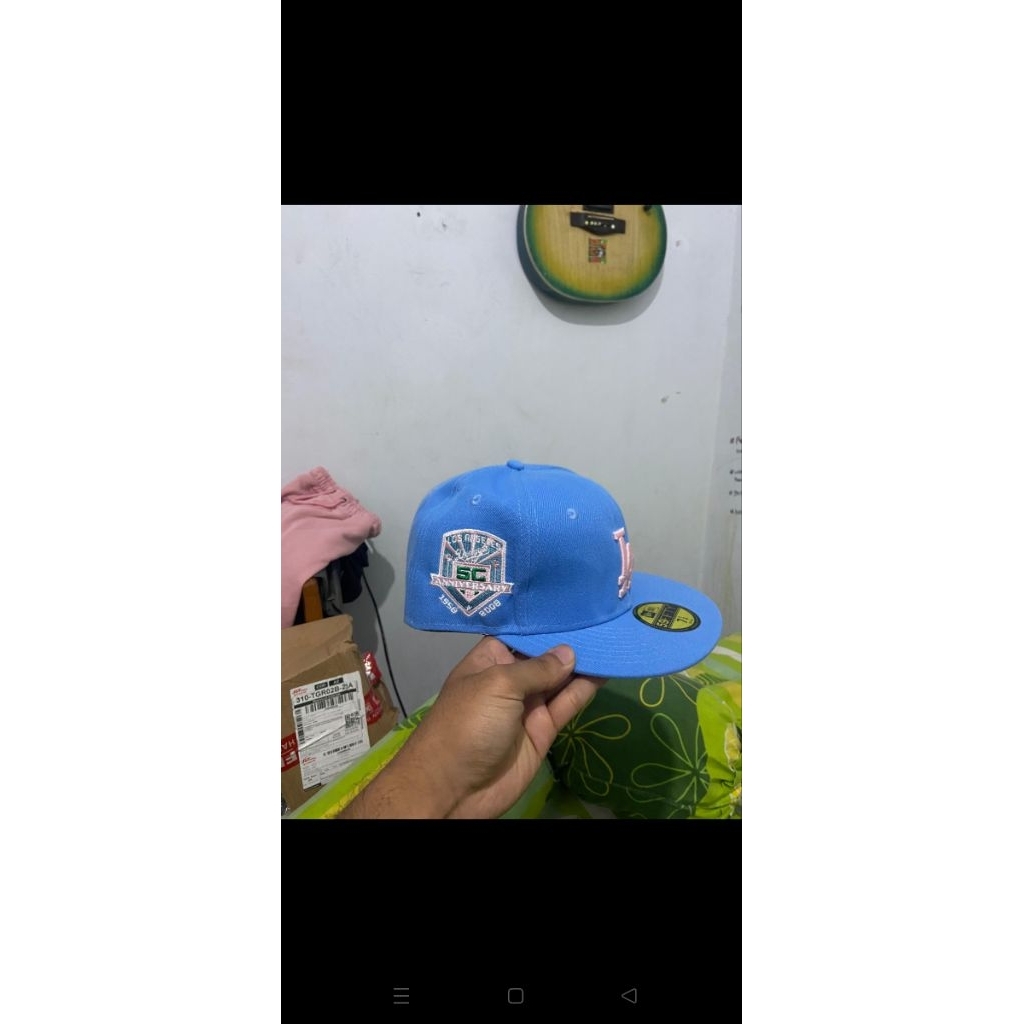 topi mlb biru pantai