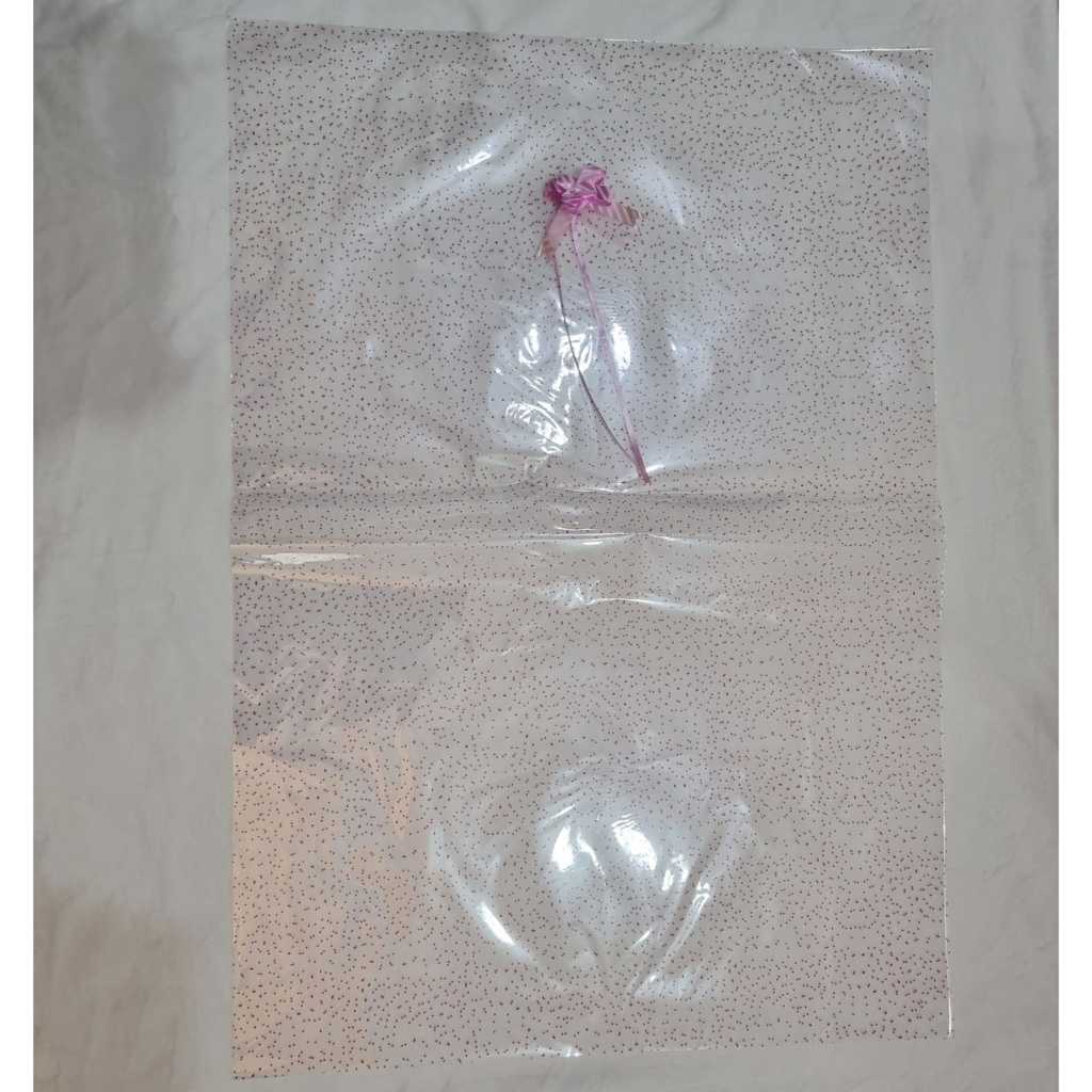 Plastik Besar dan Pita Untuk Bungkus Kado Boneka Bantal