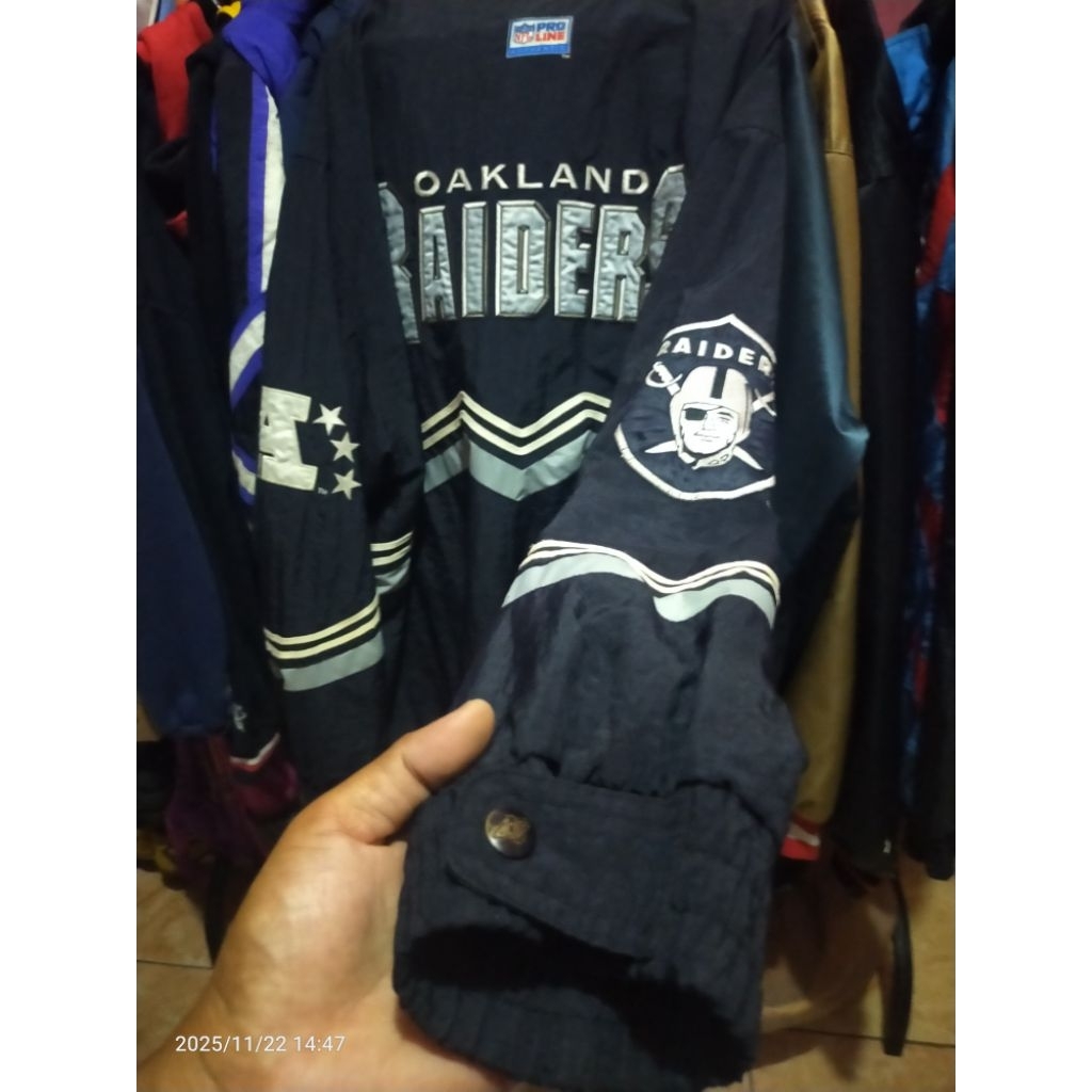 jaket starter raiders