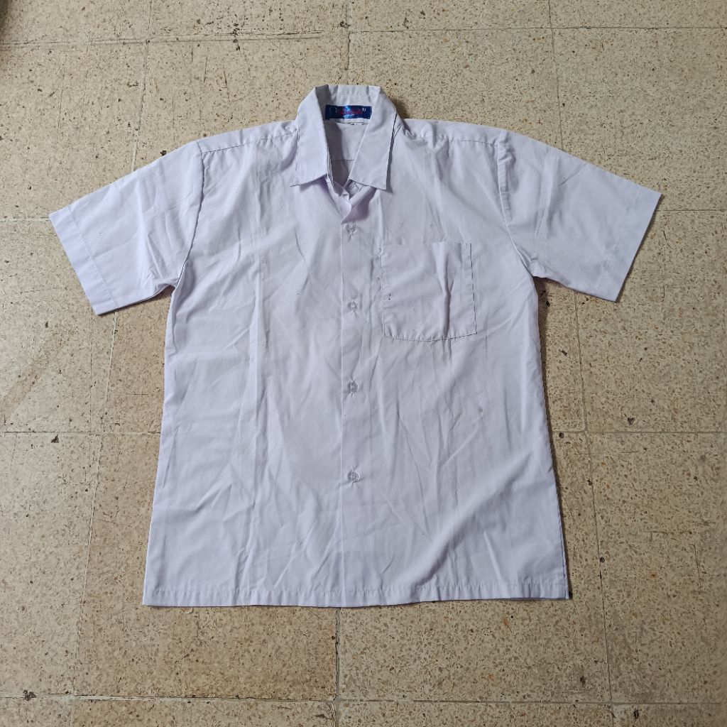PL baju sekolah putih merk seragam / ton 68