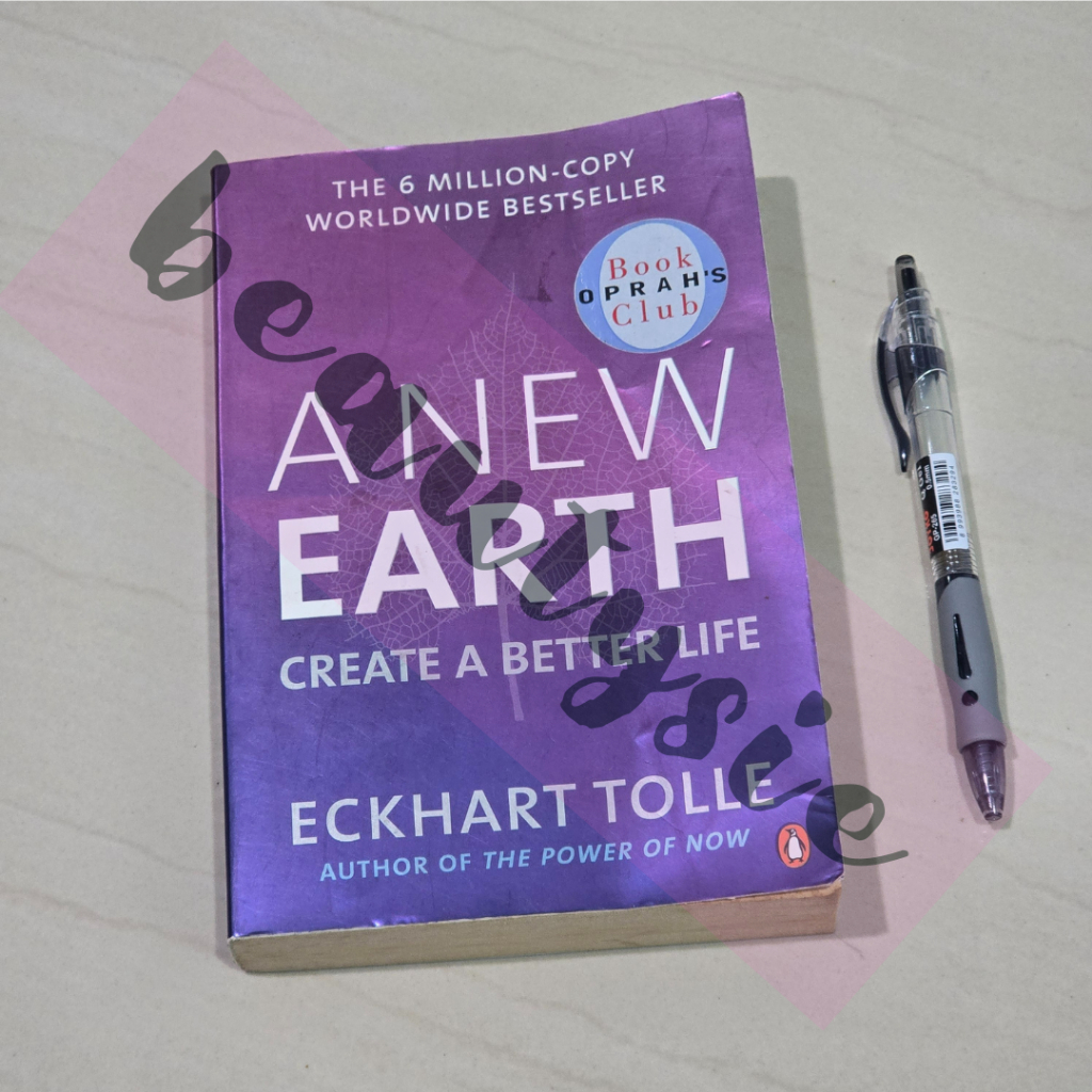A New Earth by Eckhart Tolle Purple Cover