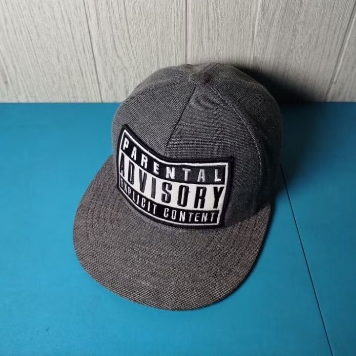 TOPI PREMIER Parental Advisory