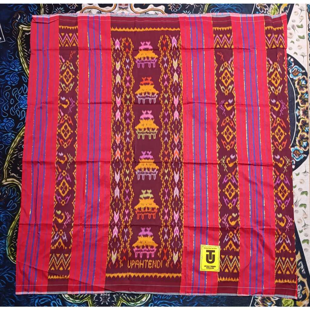 Sarung Upah Tendi Rumah Adat