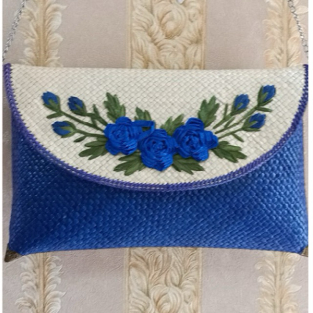 tas pesta anyam tikar