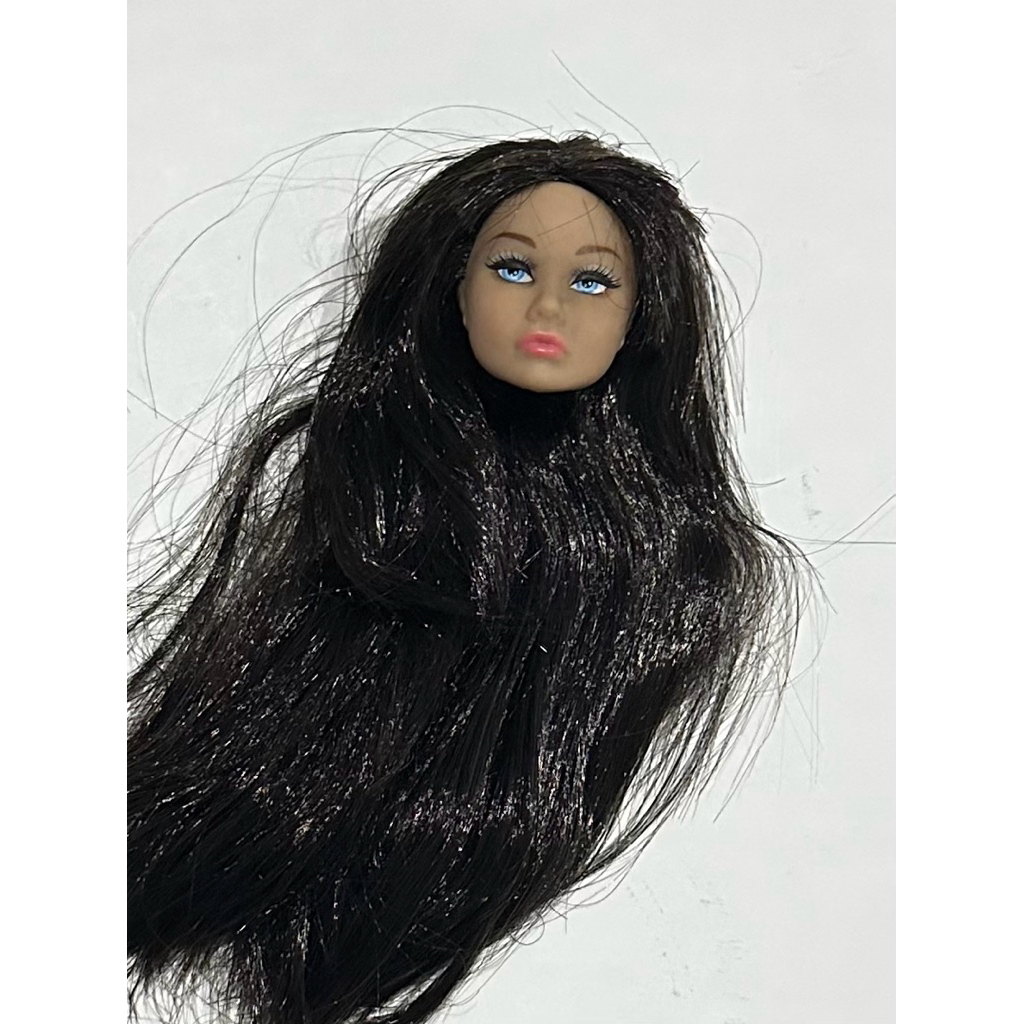 Barbie Junk rambut poninya dipotong