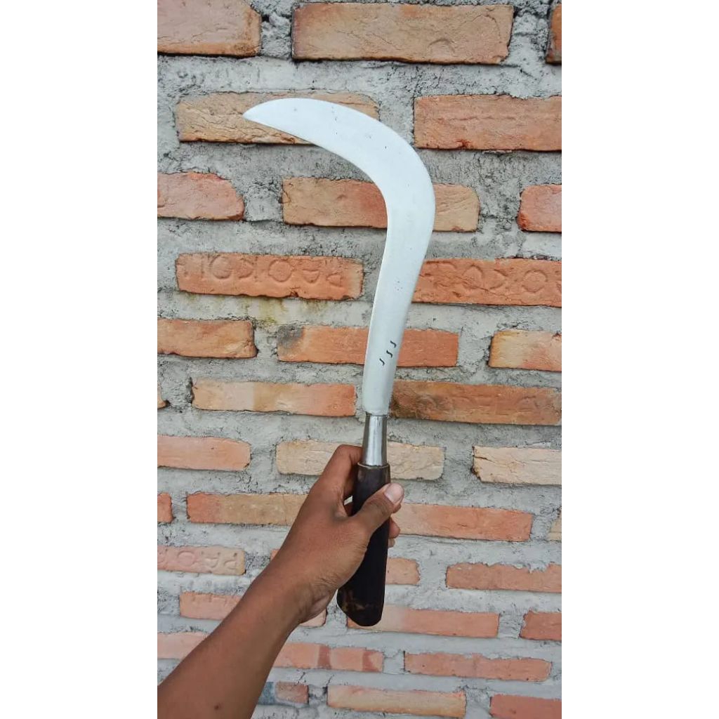 sabit rumput asli produk Madura