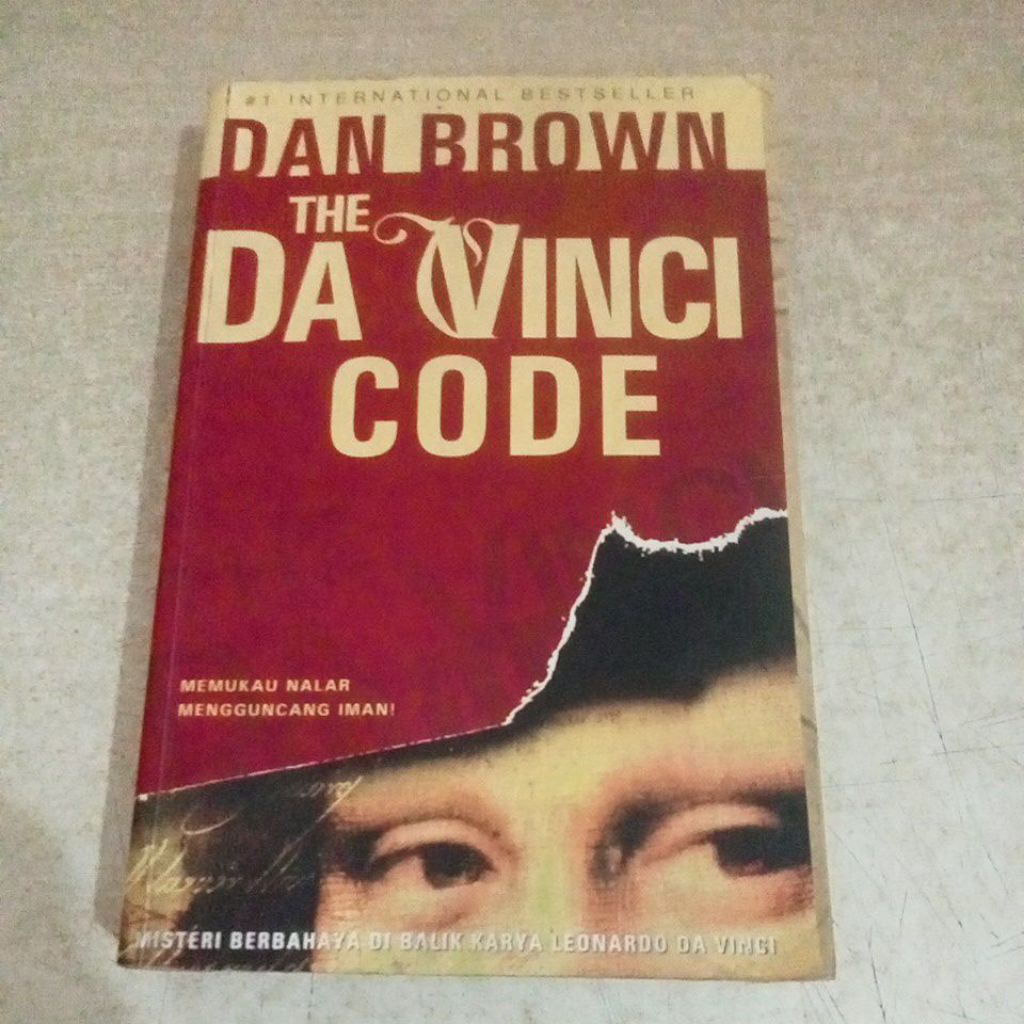 Buku DAN BROWN THE DA VINCI CODE: MEMUKAU NALAR MENGGUNCANG IMAN