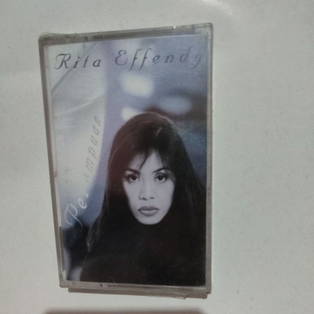 KASET RITA EFFENDY PEREMPUAN