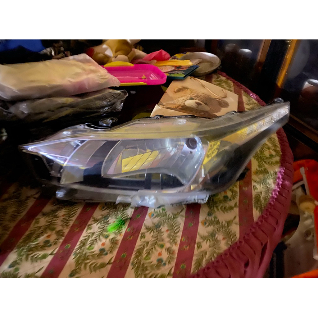 headlamp yaris lele type E
