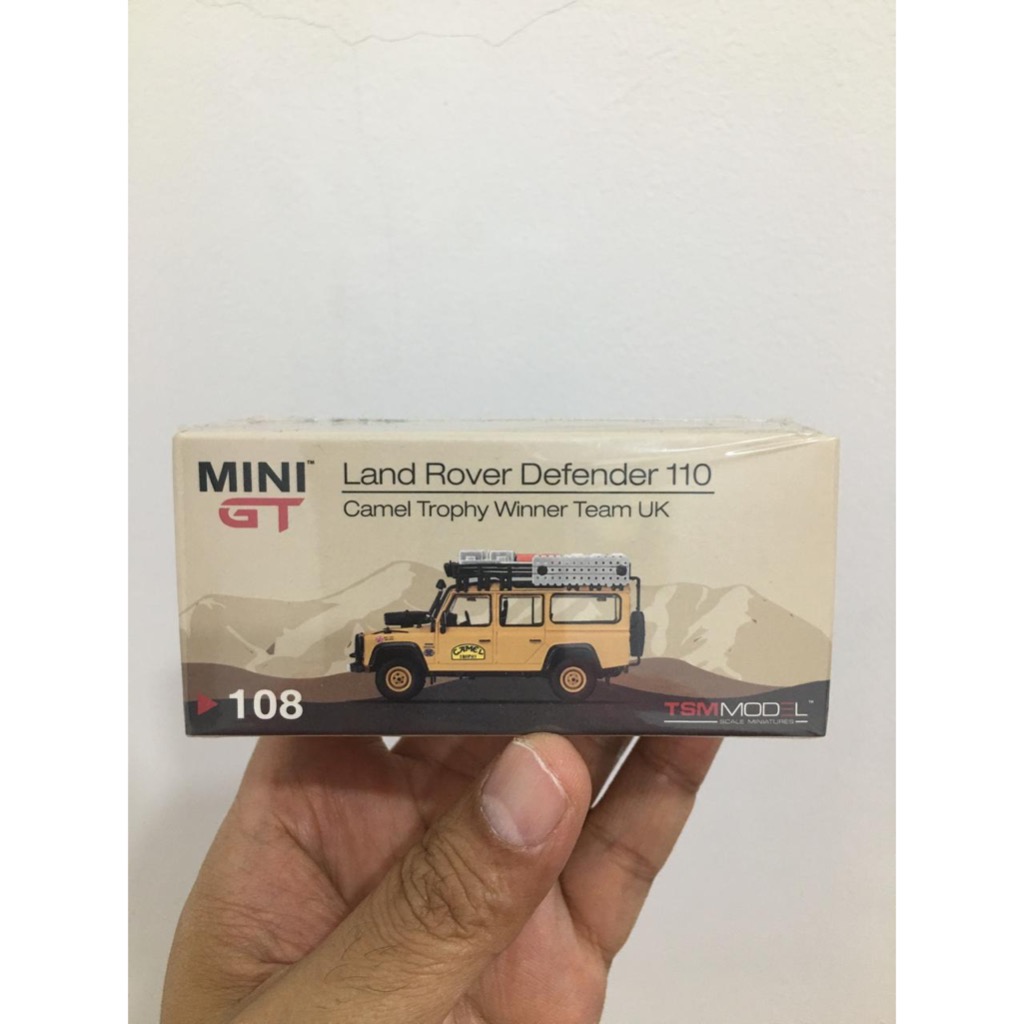 Mini GT Land Rover Defender Camel Thropy Winner UK Team