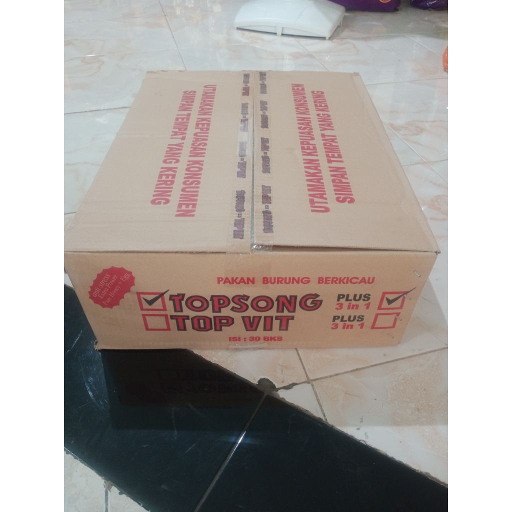 Topsong Plus Kuning/Coklat Voer Burung Kicau – 1 Dus