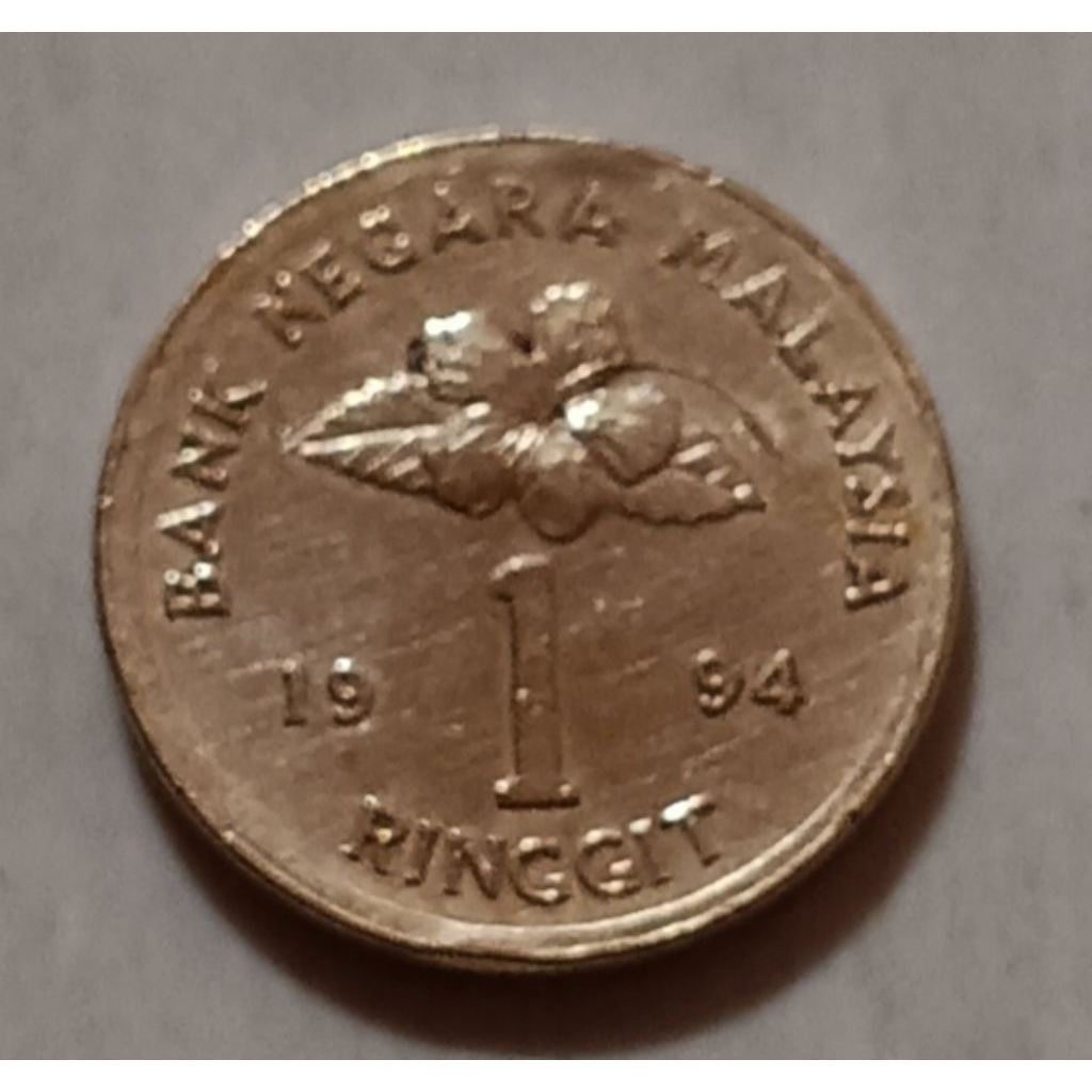 koin Malaysia 1 ringgit ( gambar keris) tahun 1994..