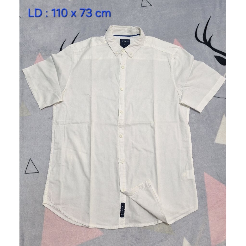 Kemeja Tripl3