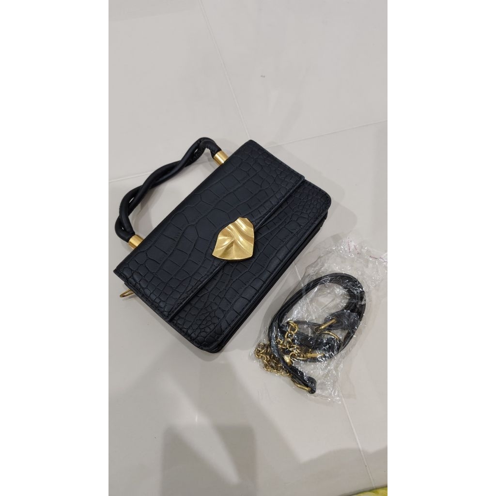 Preloved - tas pesta hitam kulit