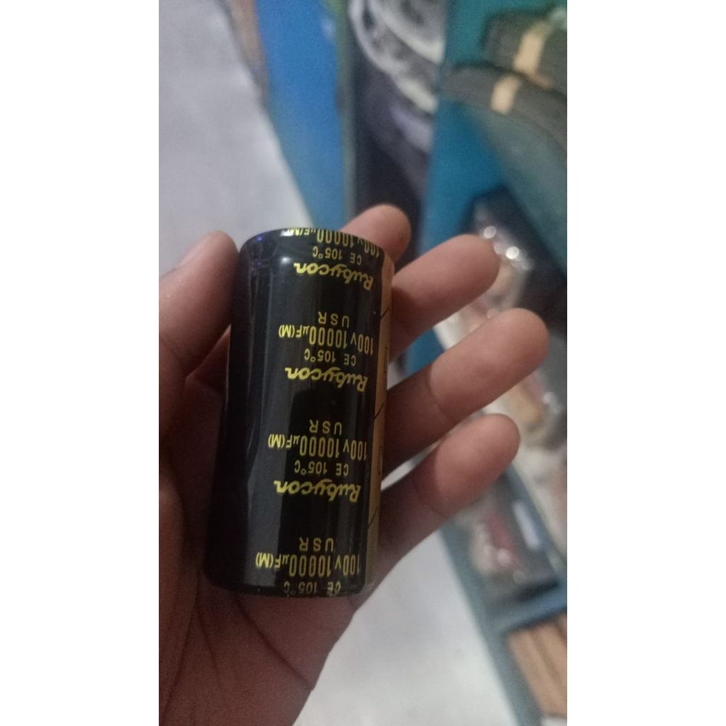 Elco 10.000/100 volt rubycon hitam pendek